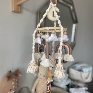 Crib mobile with hanger